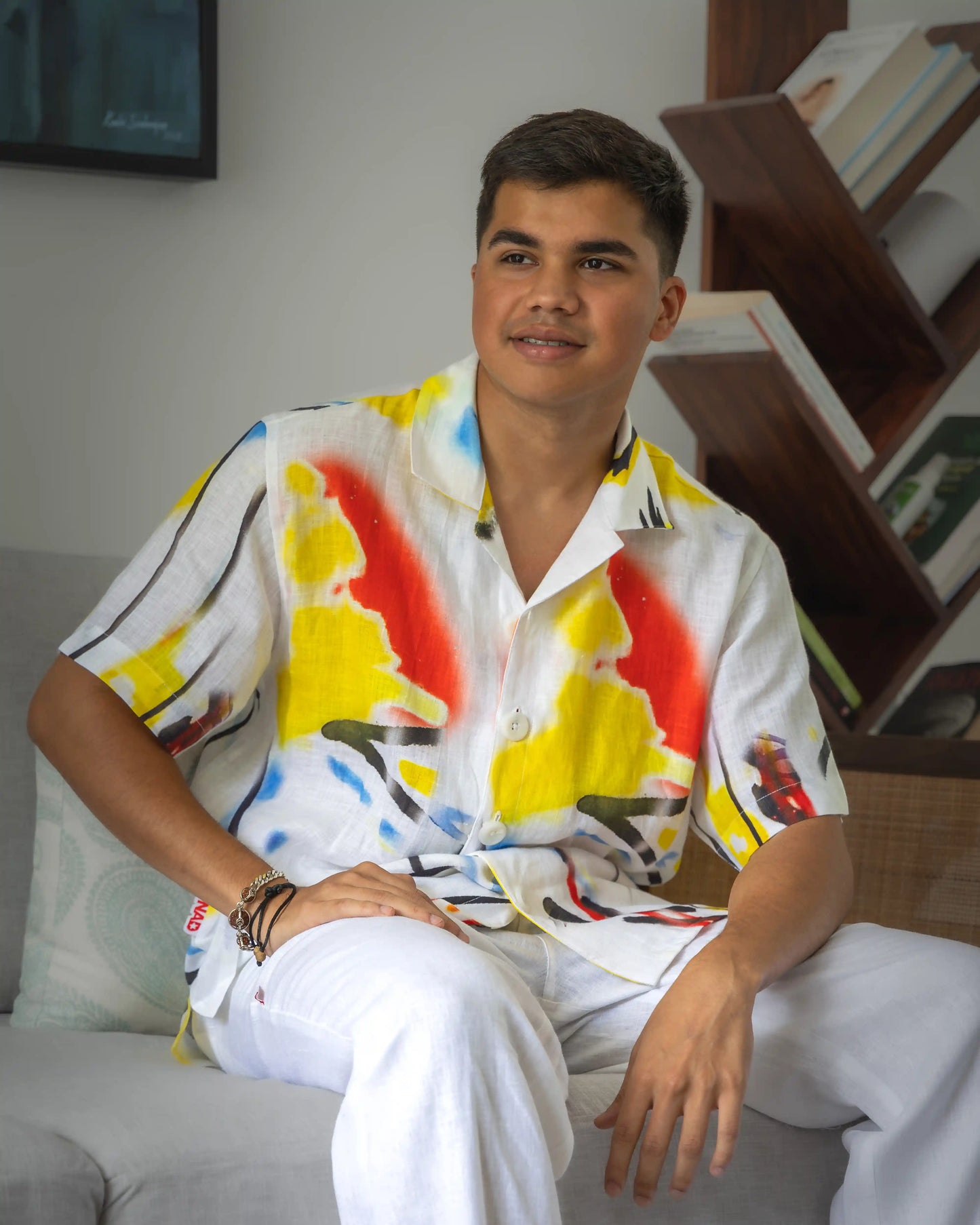 Model wearing NAD's abstract linen shirt for men.
