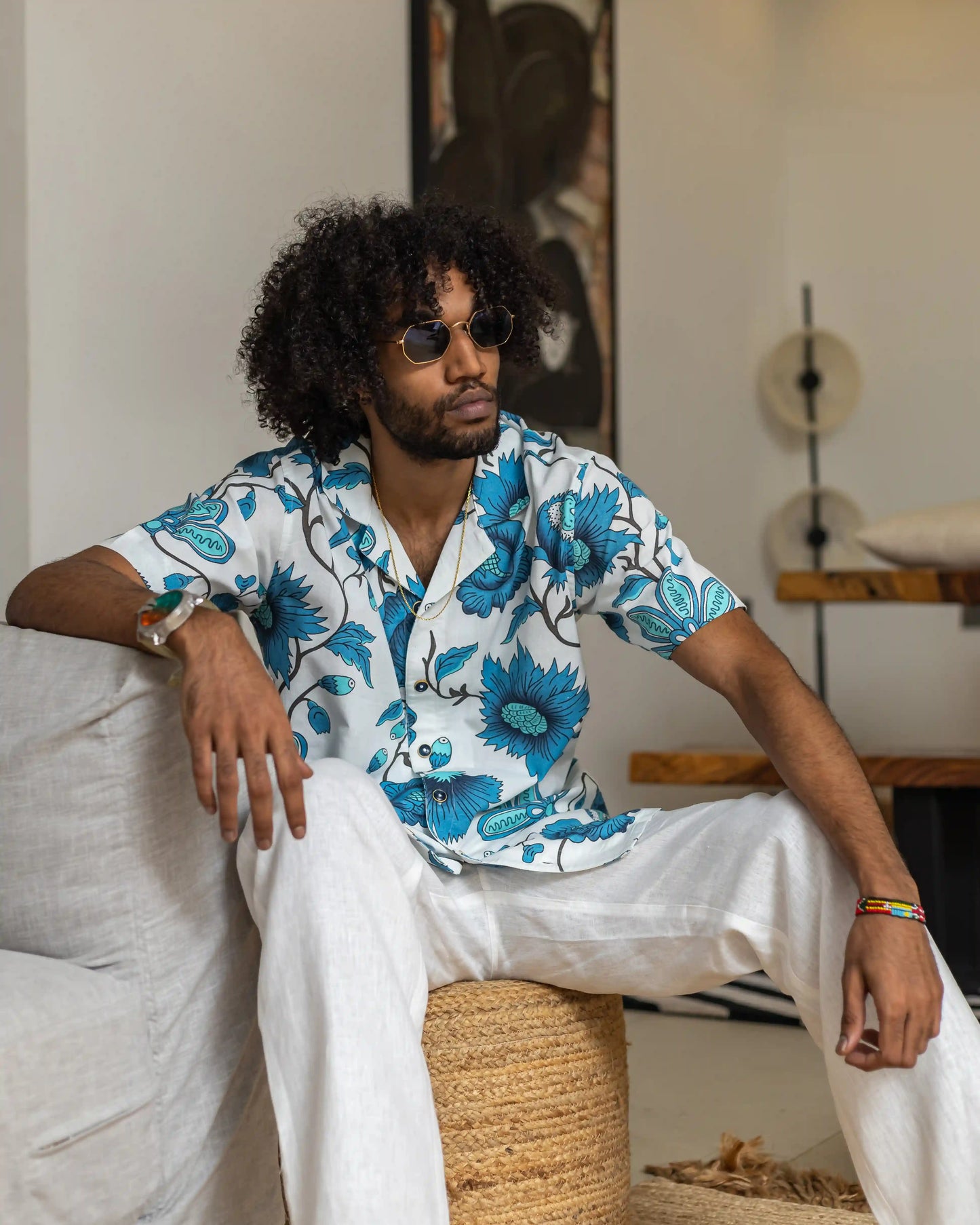 Model dressed in NAD's floral printed shirt for men.