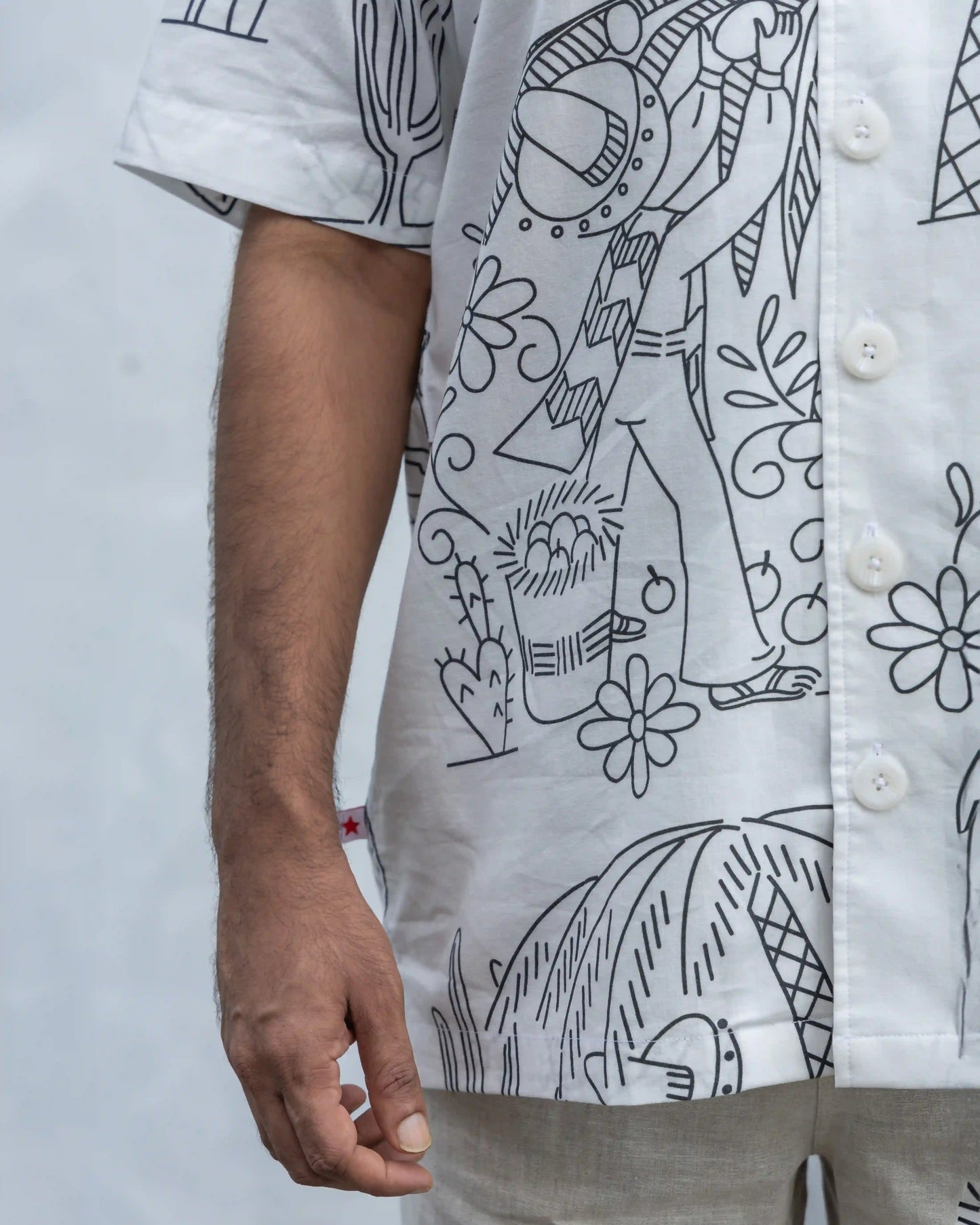 Close-up of NAD's mexican black & white printed shirt for men.