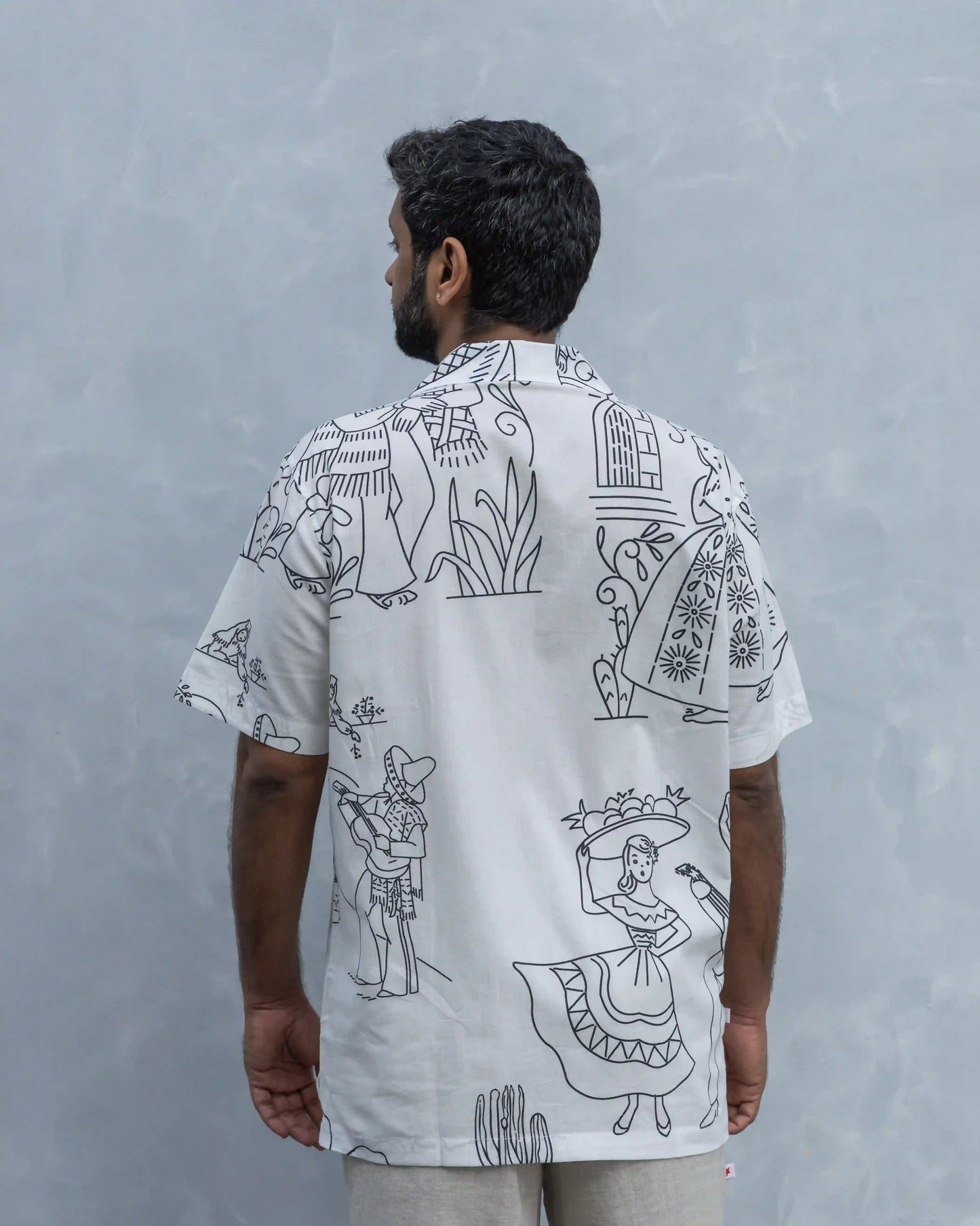 Back shot of NAD's Mexican black and white printed shirt for men.
