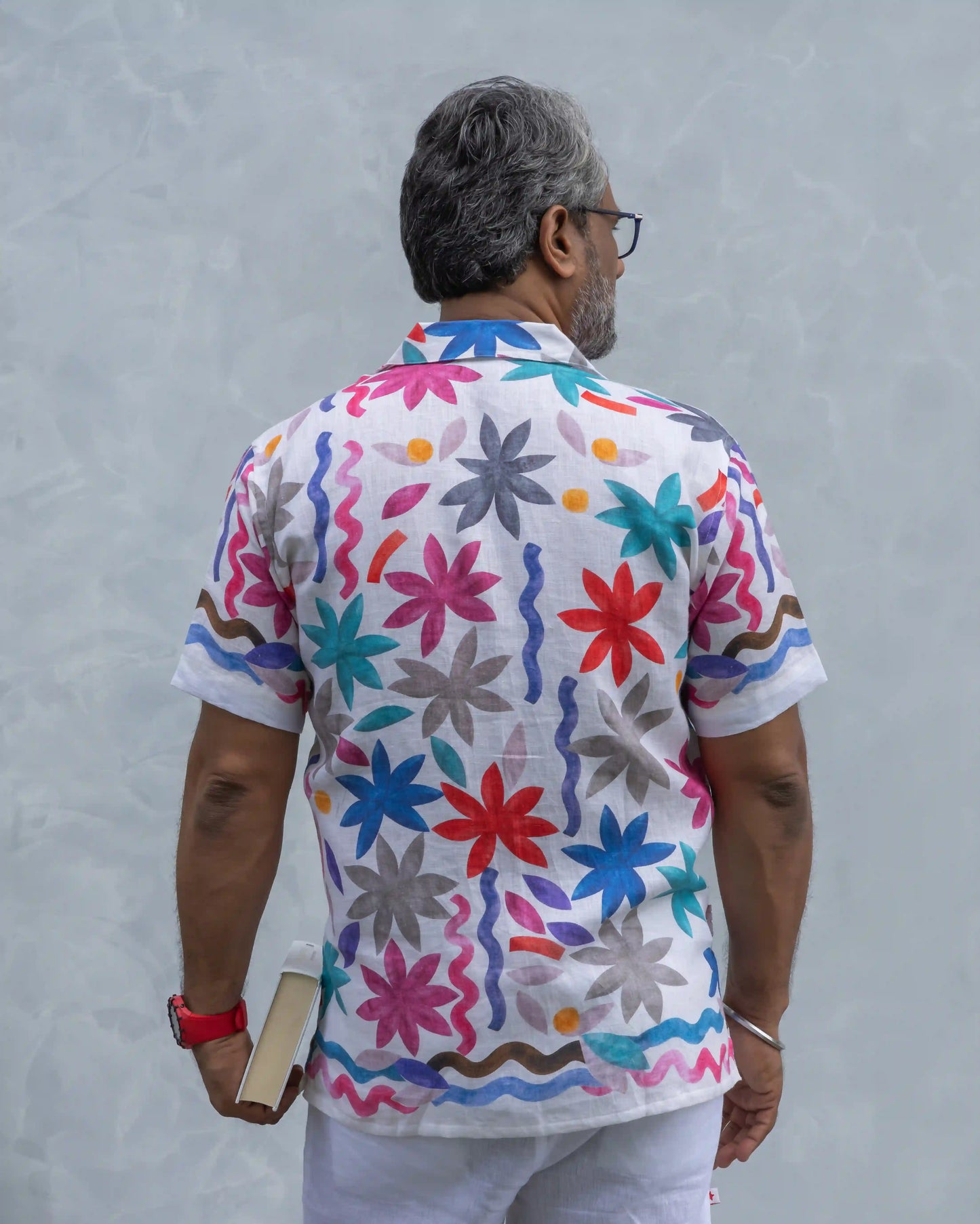 Back shot of a model dressed in NAD's multi-coloured floral shirt for men.