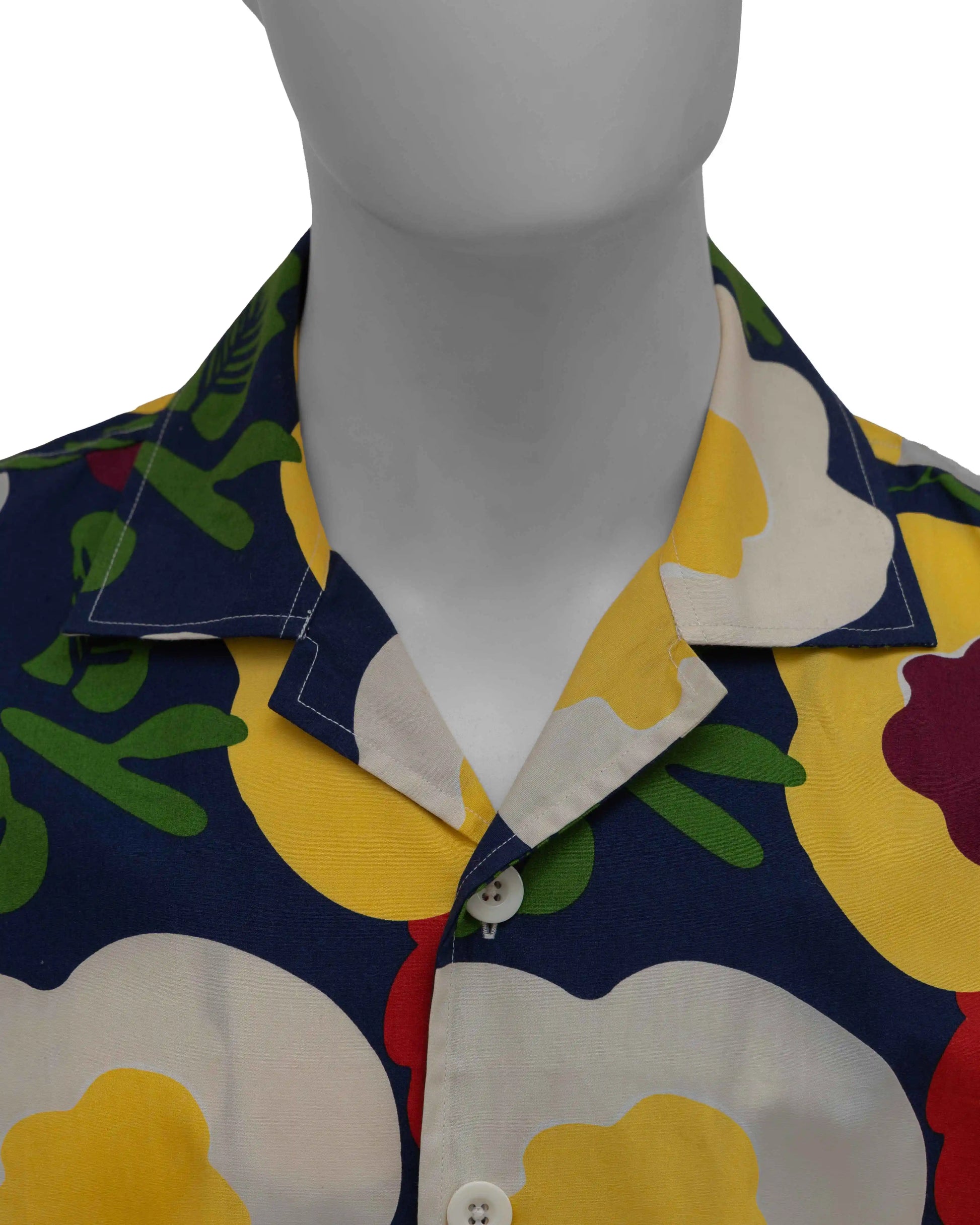 A mannequin displays a yellow pop floral NAD shirt for men, showcasing a pattern of colorful flowers on a light background.