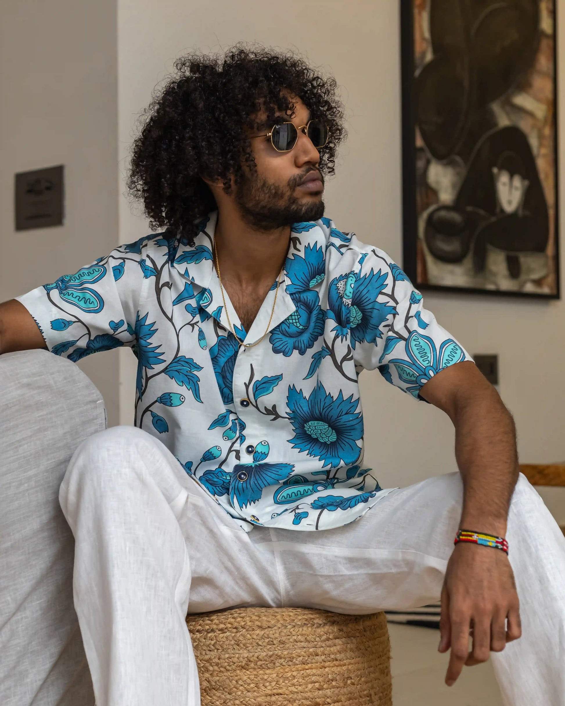 Model in NAD's floral printed cotton shirt for men. 