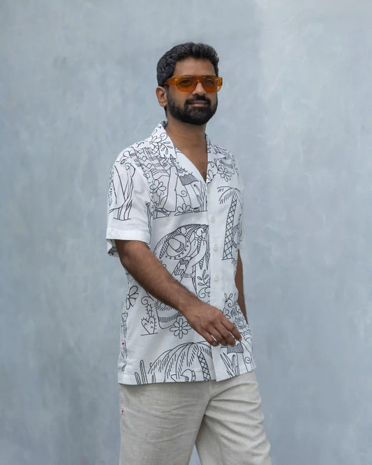 Model in NAD's Mexican black and white printed shirt for men. 