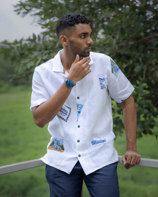 Model dressed in NAD's stamp print linen shirt for men. 